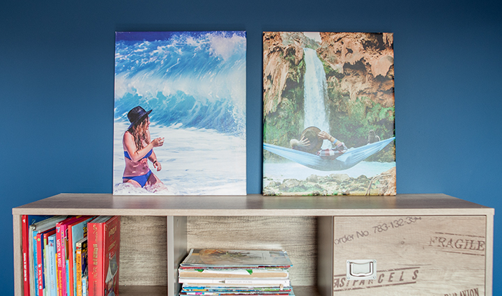 2 travel photo canvases on a shelf