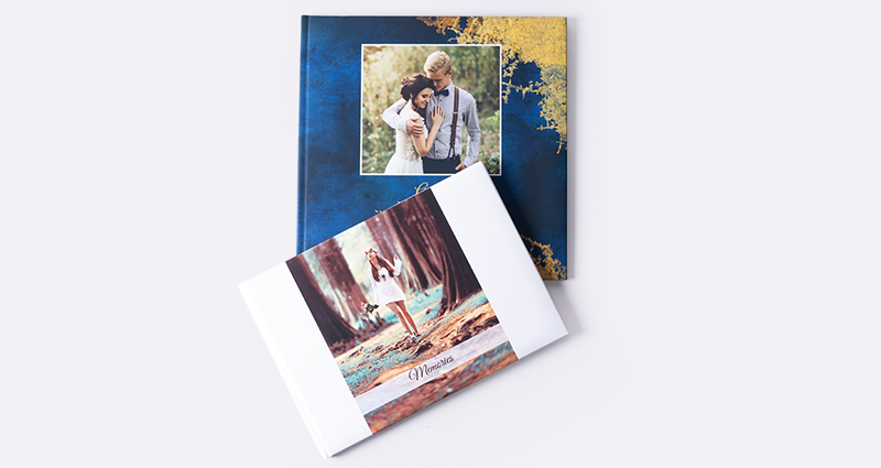 Dviejų skirtingų formatų Starbook su skirtingu nuotraukų išdėstymu viršelyje