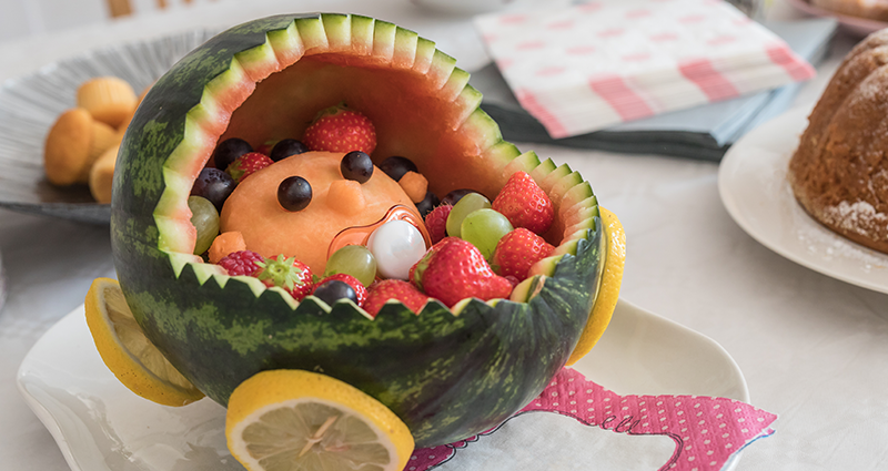 A watermelon carved to look like a cradle