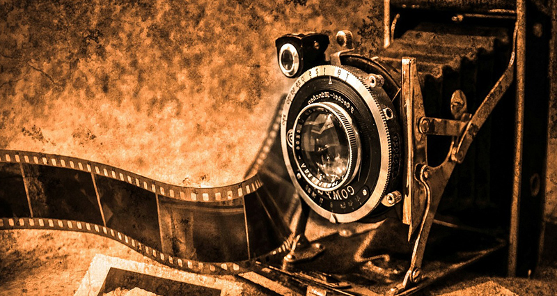 Starý fotoaparát a retro fotografie.