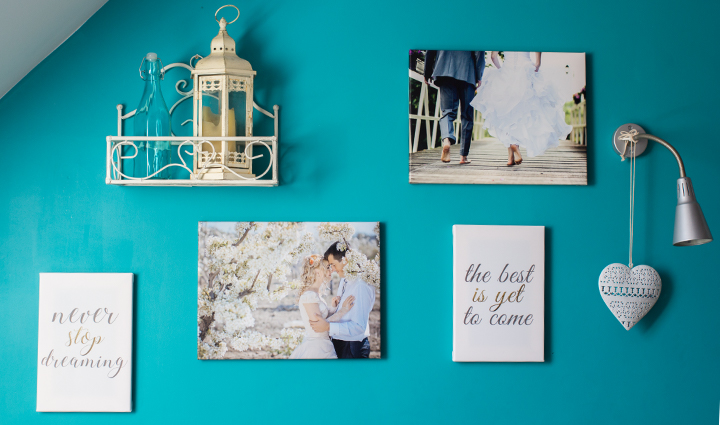 Collection of canvases on a wall – 2 canvases with pictures and 2 with sayings