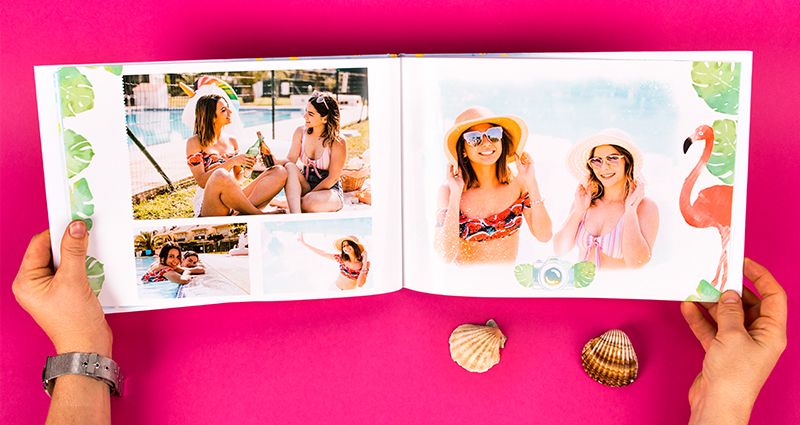 Holiday photobook with photos of two friends, a template with monstera leaves and a flamingo