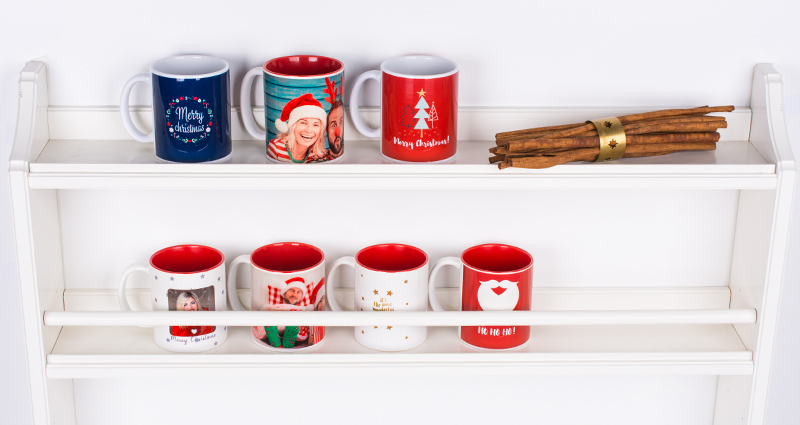 Photo mugs on a shelf.