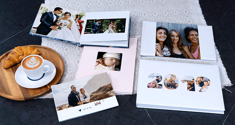 A Classic Photo Book, an Exclusive Photo Book, a Photo Album, a Starbook and an A5 Photo Book created using the Yearbook template