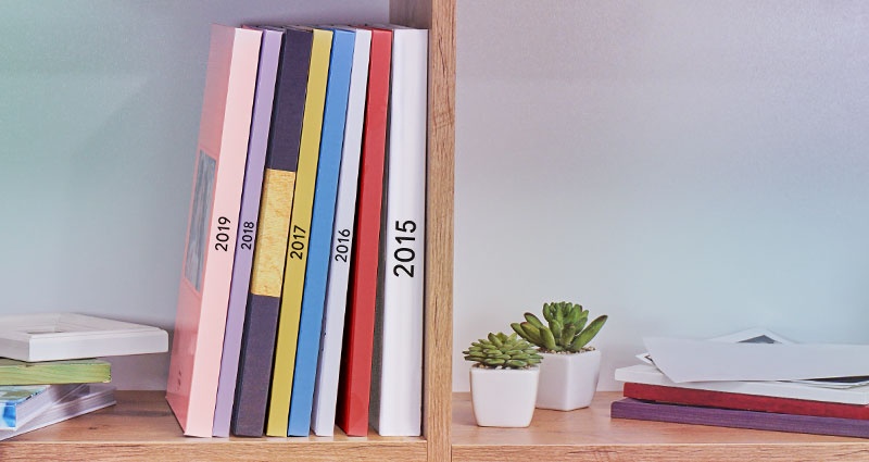 A Yearbook in the form of a Photo Book placed on a shelf