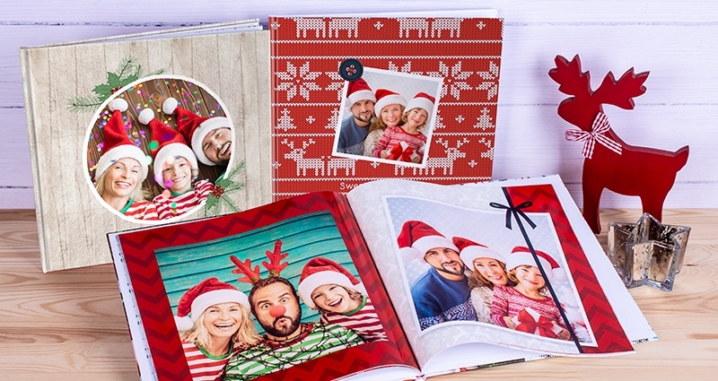 Three Christmas square photo books