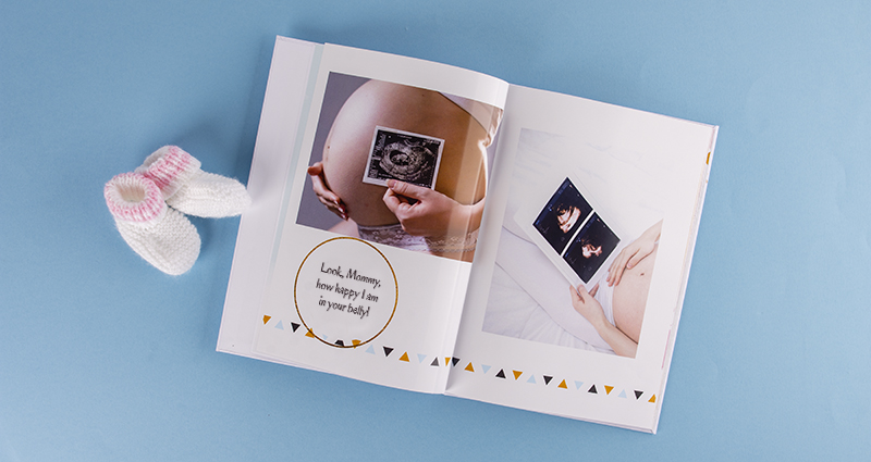 Photo book of a pregnancy photo session and pictures from ultrasound examinations.