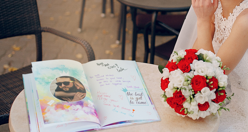 Wedding Guest Book on the table, wedding guest having fun in the background 
