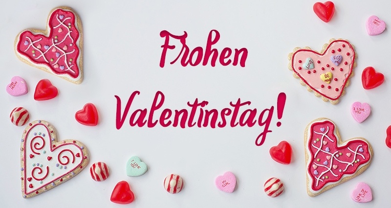 Herzförmige Valentinskuchen mit Wünschen Frohen Valentinstag