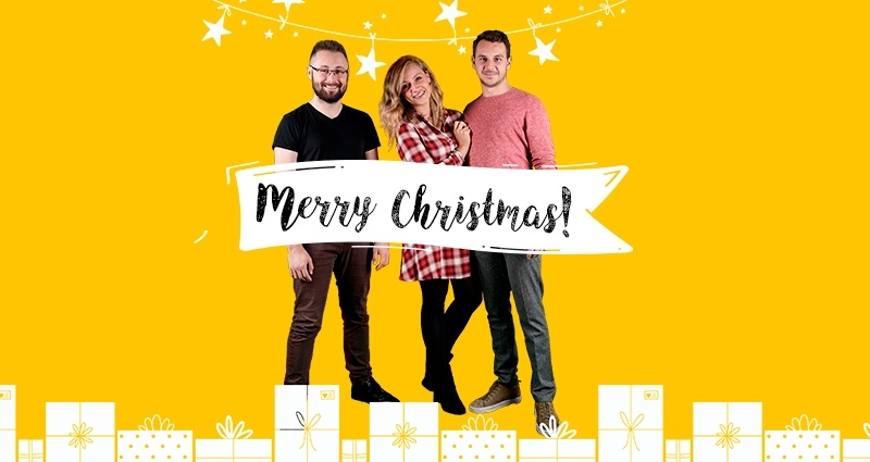 Two men and one woman on the yellow background. There is a Christmas chain on the top, a „Merry Christmas” sash in the middle and gifts at the bottom of the image.